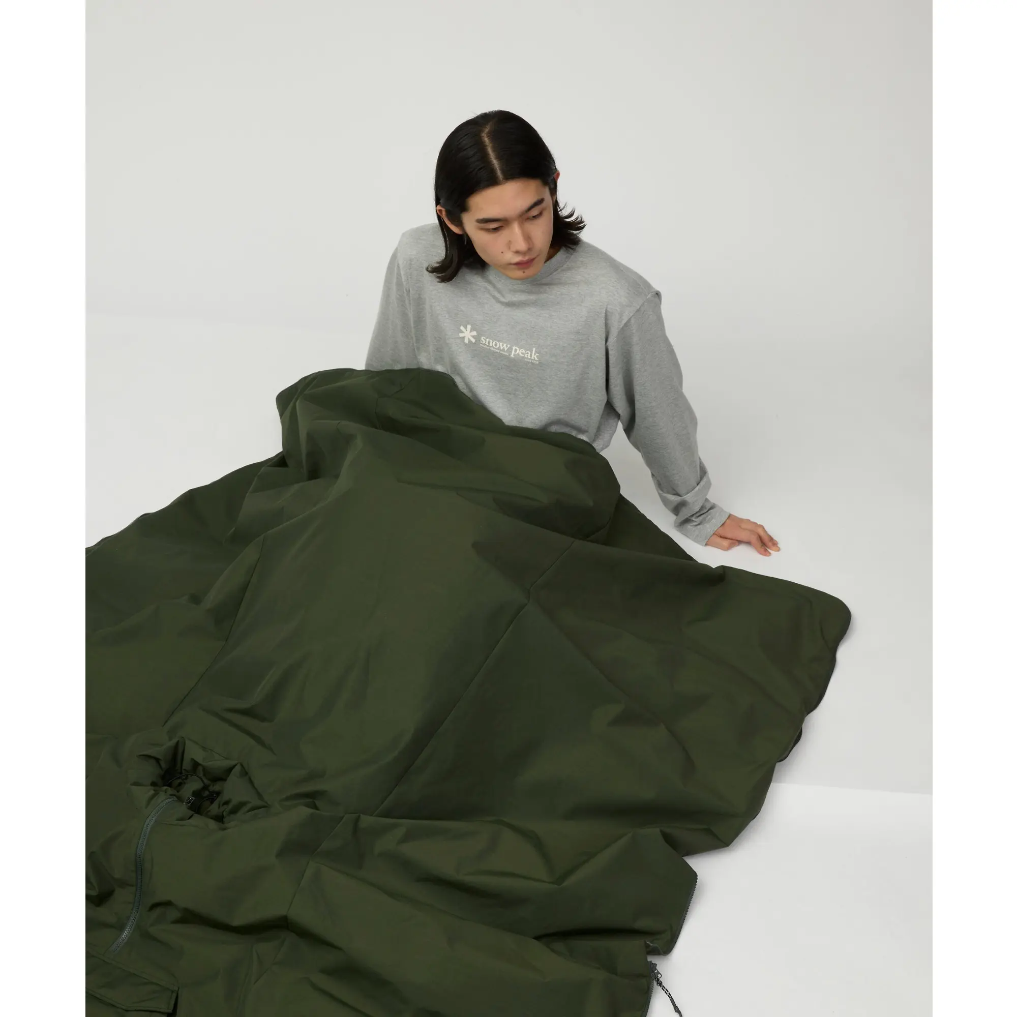 Product image 8 of 11 of Snow Peak FR 2L Down Poncho - Dark Olive
